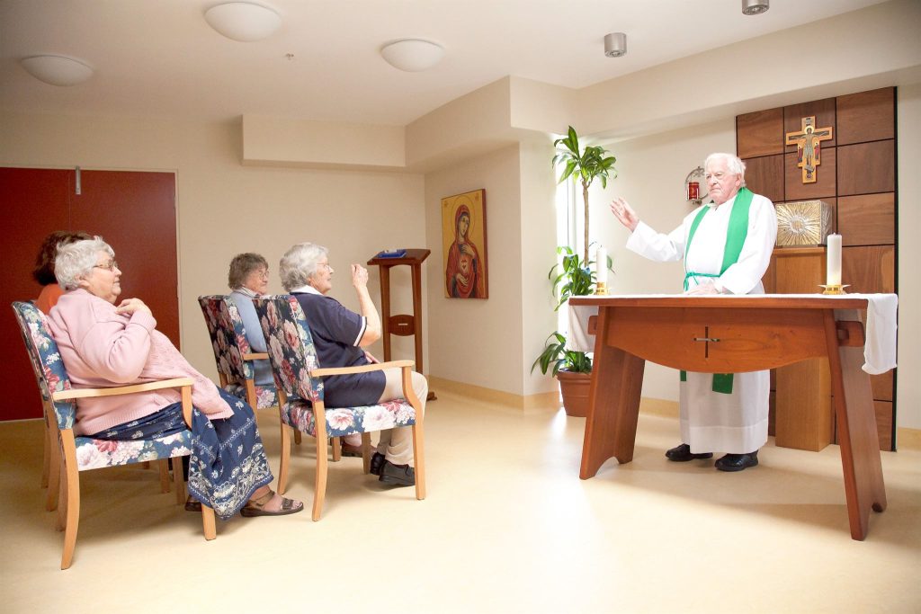 Residents attending a chapel service