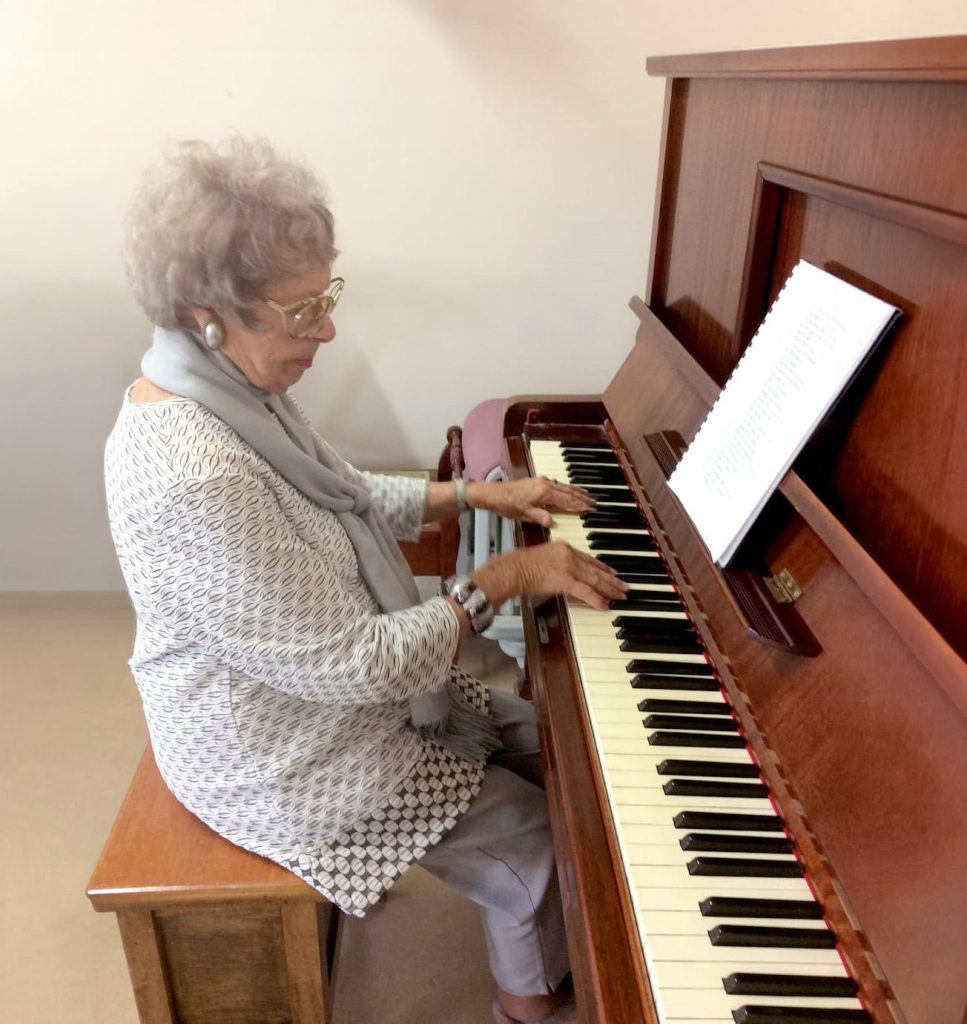 A resident playing the piano